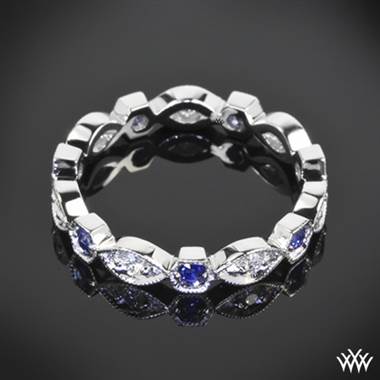 18k white gold odyssey diamond and blue sapphire right hand ring.