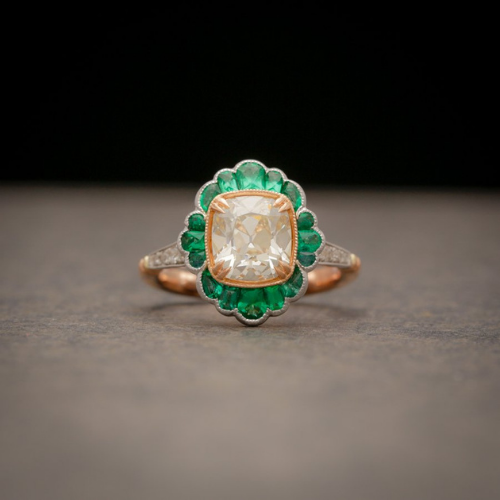 AVC diamond ring with emerald halo.