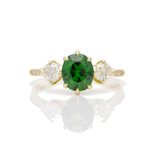 Tourmaline three stone diamond ring.