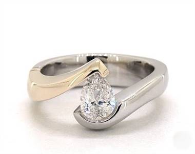 Two-tone pear tension engagement ring set in 14K white gold and yellow gold with a 4mm width band at James Allen