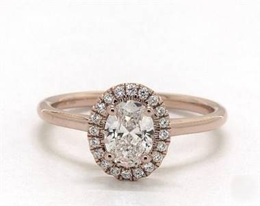 Sleek oval pave halo engagement ring set in 14K rose gold 1.8mm width band at James Allen
