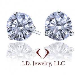 Round diamond stud earrings set in 14K white gold at I.D Jewelry.