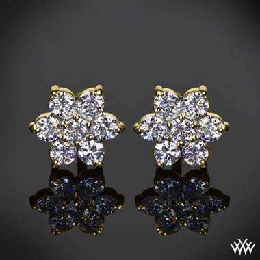 Flower cluster diamond earrings set in 14K yellow gold at Whiteflash.