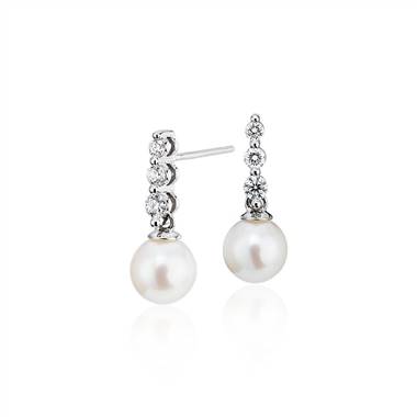 For inspiration: Freshwater cultured pearl trio diamond drop earrings set in 14K white gold at Blue Nile