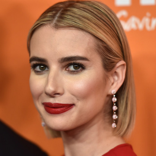 Emma Roberts wearing Drop Earrings. 