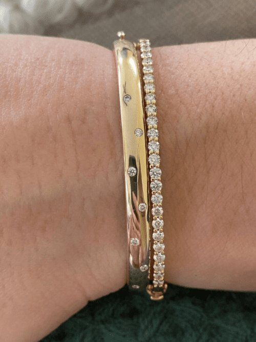 Whiteflash ahred prong bangle and a scattered diamond bangle.