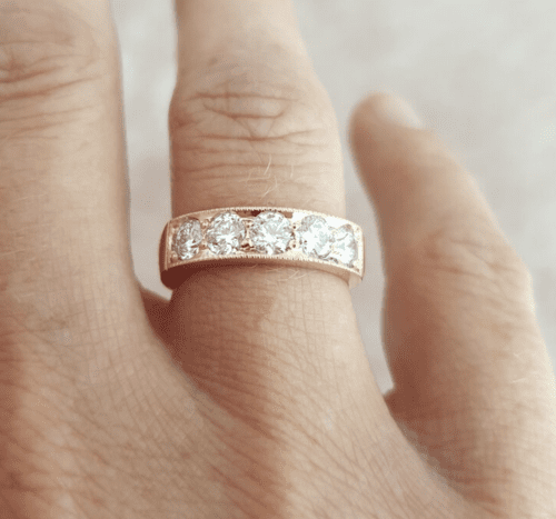 ROSE GOLD AND DIAMOND FIVE-STONE RESET