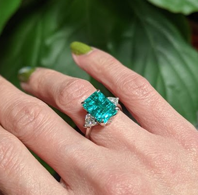  EMERALD, DIAMOND, AND PLATINUM RING