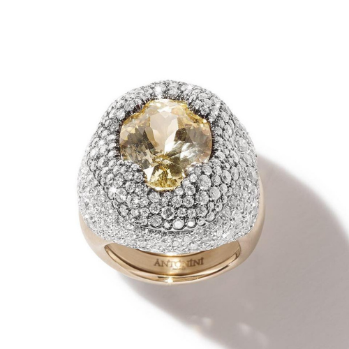 Cocktail ring in satin gold, 4.08 total carat weight worth of diamonds and a 10.85 carat yellow sapphire.