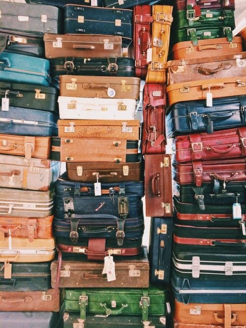 stacks of colorful suitcases