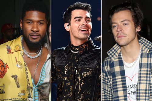 Usher in a yellow button down shirt with the top buttons open to expose a pearl necklace, Joe Jonas in a black lace top with a pearl necklace, and Harry Styles in a plaid jacket and a white graphic tee with a pearl necklace