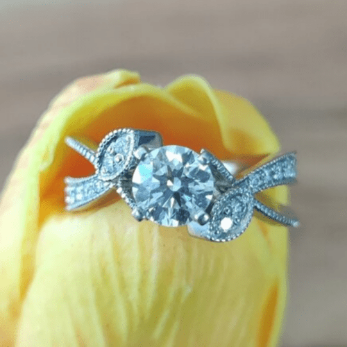 Yellow tulip blossom with a diamond ring on the petals