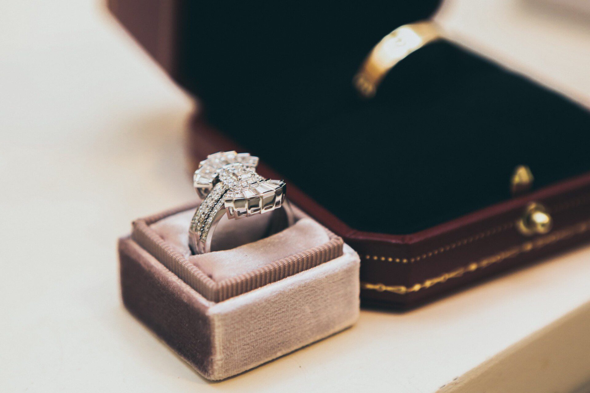 Diamond ring in suede ring box. 