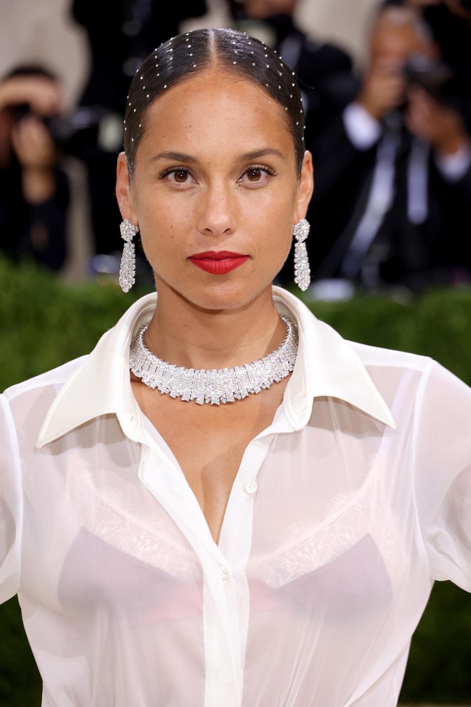 Alicia Keys wearing Van Cleef.