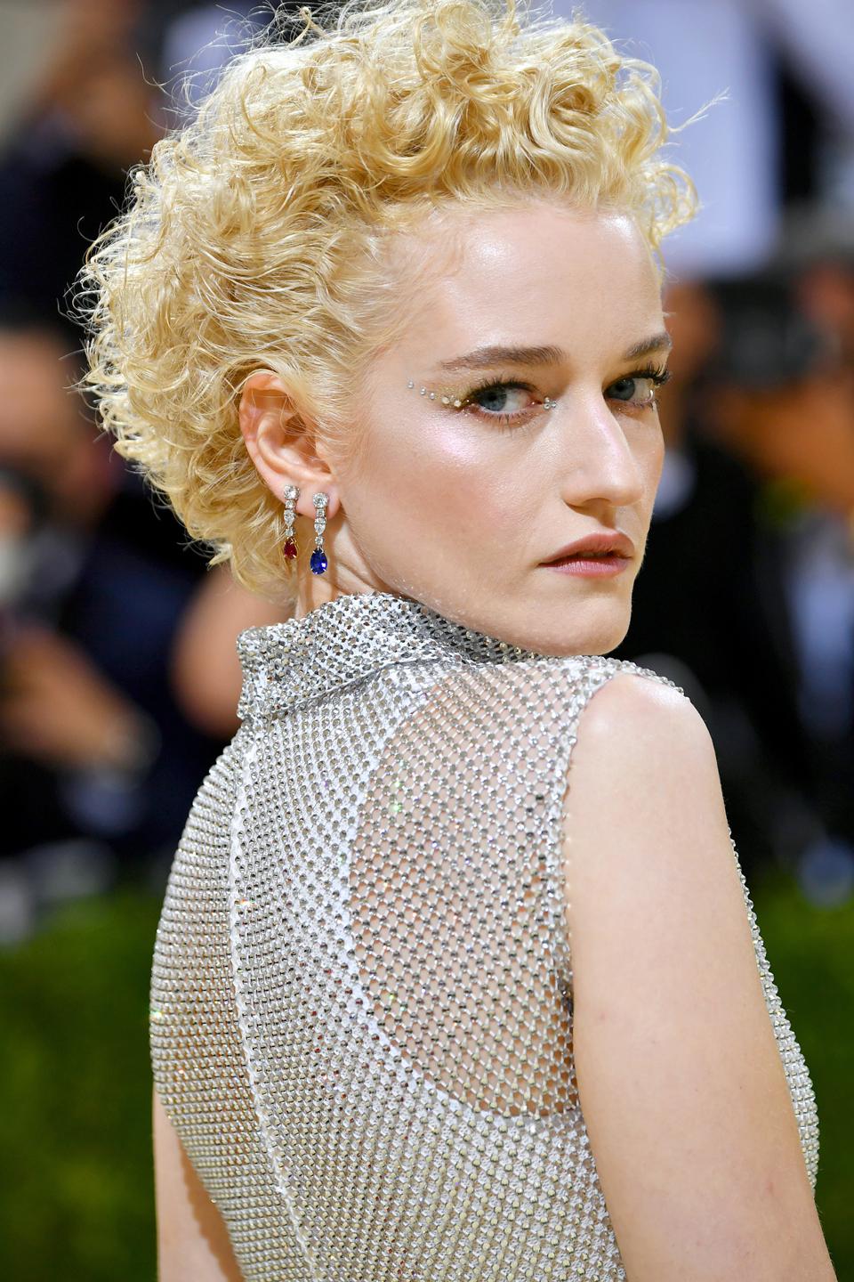 Julia Garner wearing Harry Winston.