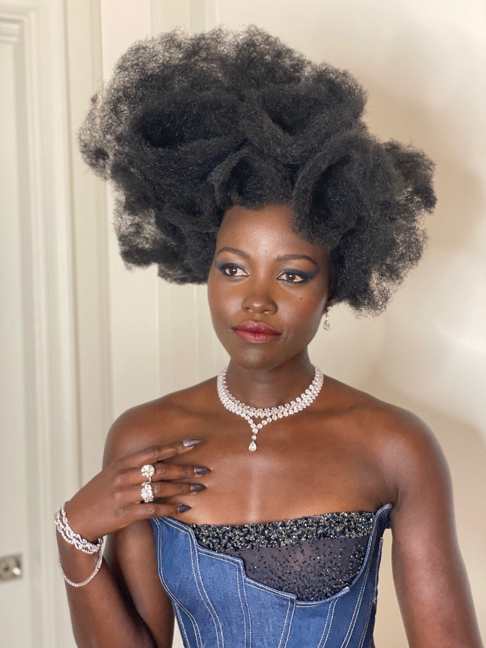 Lupita Nyongo wearing De Beers.