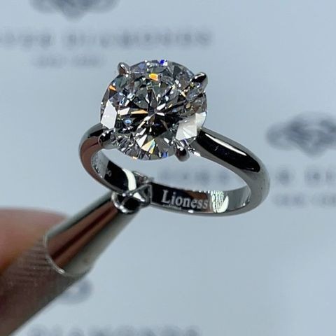 round solitaire diamond ring.