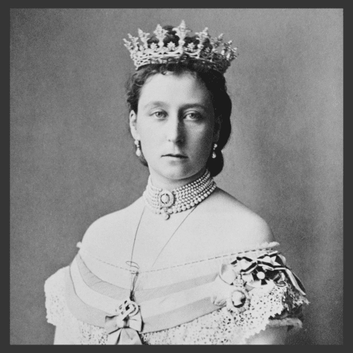 Black and white image of a royal woman in an off the shoulder court gown, wearing a tiara. 