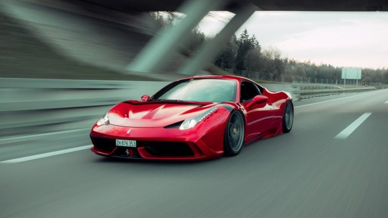 Ferrari on road.
