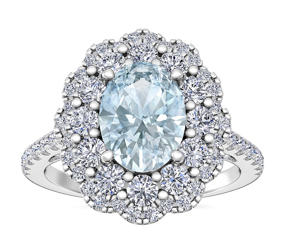 Vintage Diamond Halo Engagement Ring with Oval Aquamarine in 14k White Gold.