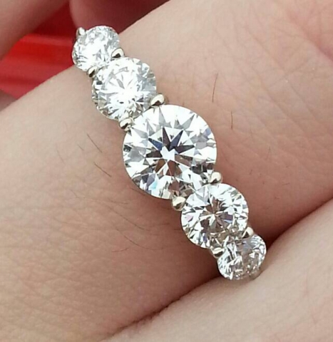 5 stone graduated rounds diamond ring.