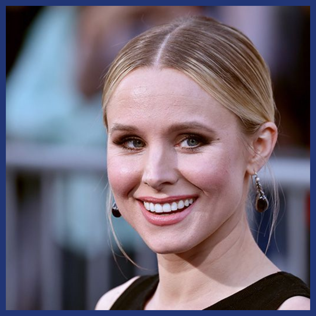 Kristen Bell wearing garnet drop earrings.