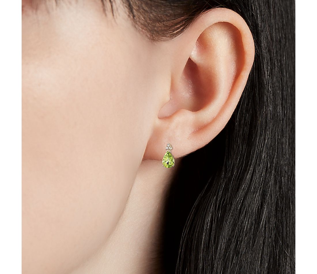 Pear-Shaped Peridot Earrings with Diamond Trio in 14k Yellow Gold.