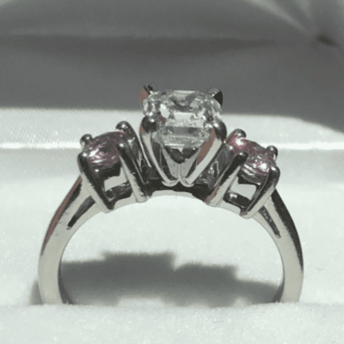 diamond and pink sapphire ring in a ring box