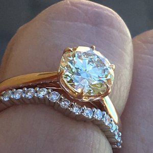 diamond ring on a finger