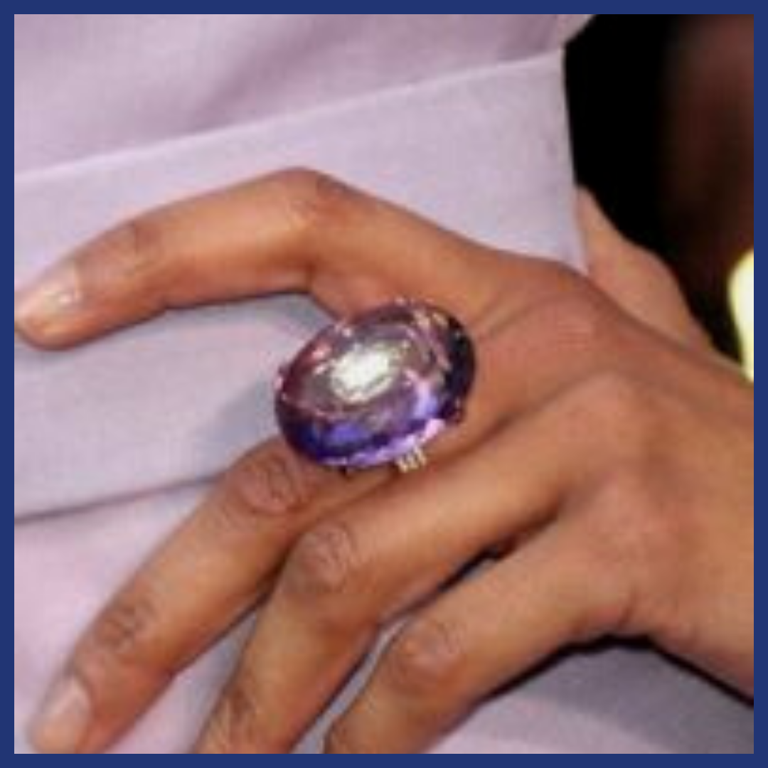 Zoe Saldana wearing an Amethyst ring - close up.