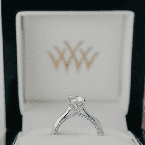 Diamond ring in a ring box.