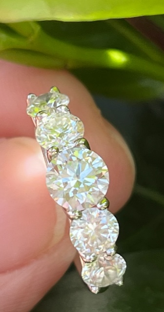 Graduated five stone diamond ring.
