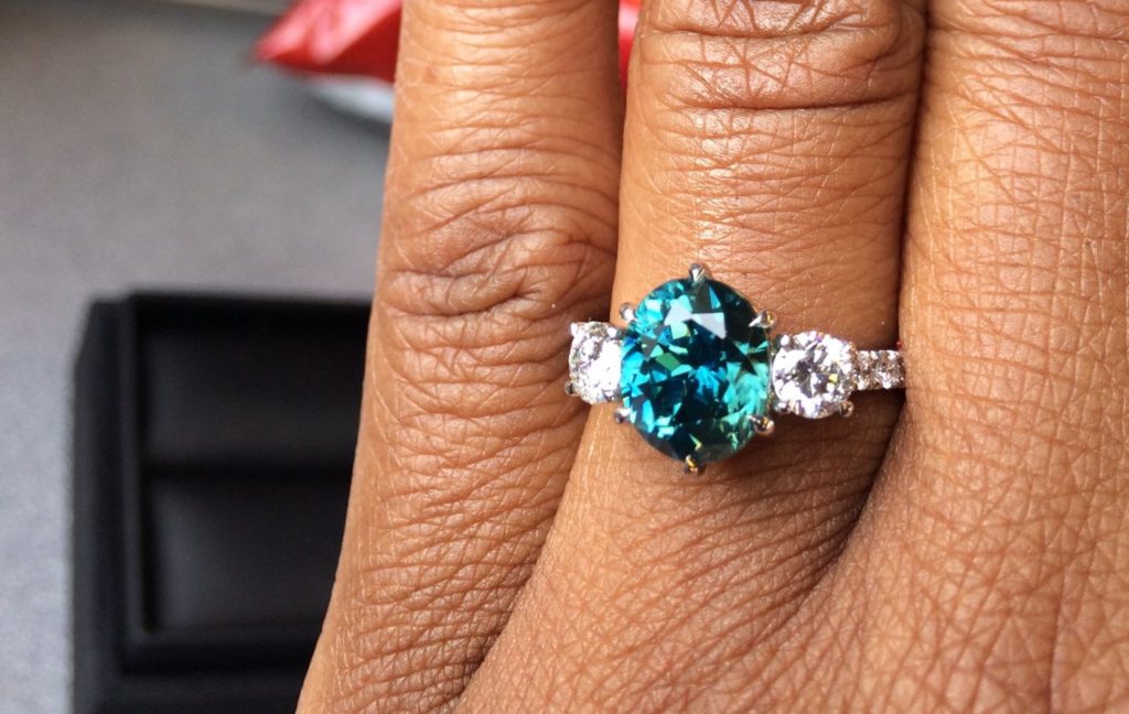 Green blue zircon and diamond ring.