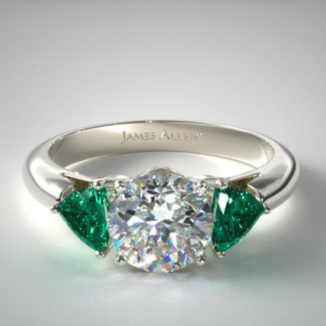 18K White Gold Three Stone Trillion Shaped Emerald Engagement Ring.