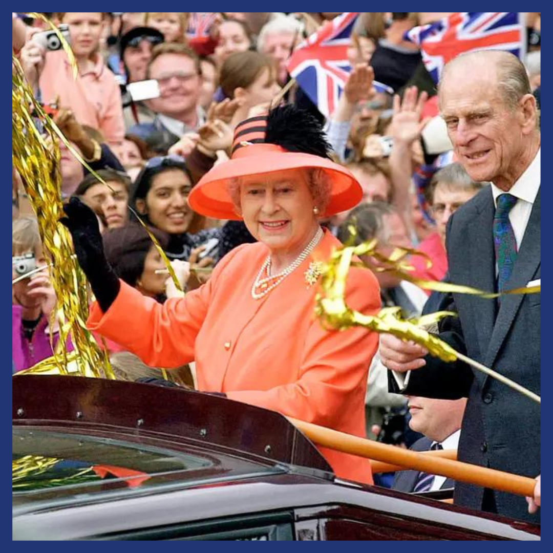 Queen Elizabeth II and Prince Phillip the Duke of Edinburgh on their way to watch a Golden Jubilee parade on June 4, 2002. 