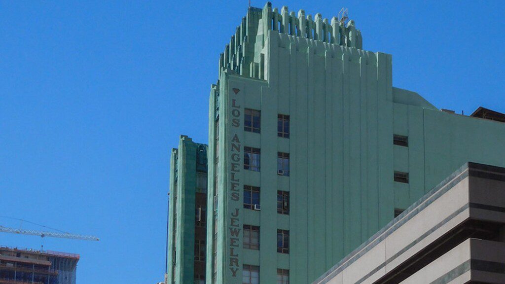 Grey district building, with Los Angeles Jewelry printed down the side of the building