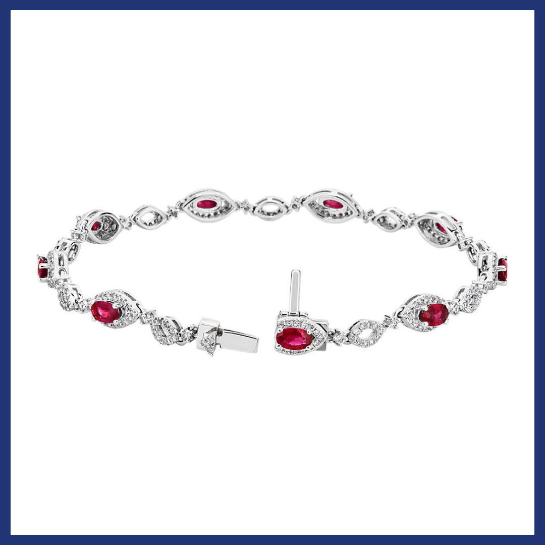Oval Ruby and Round Diamond Bracelet in 14k White Gold.