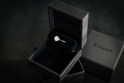 Ritani's matt black ringbox with engagement ring inside