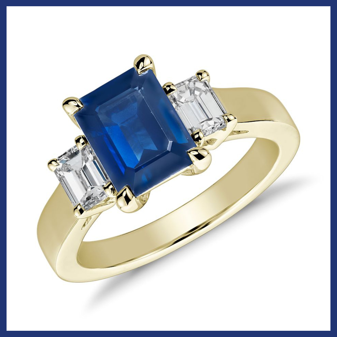 Emerald Cut Sapphire and Diamond Ring in 14k Yellow Gold.