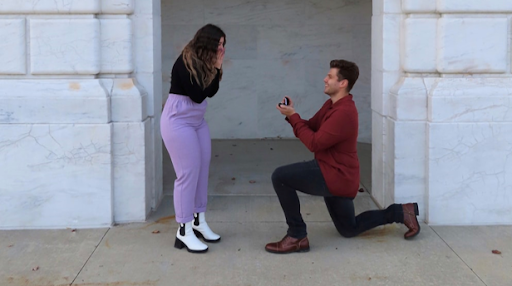 Man down on one knee proposing