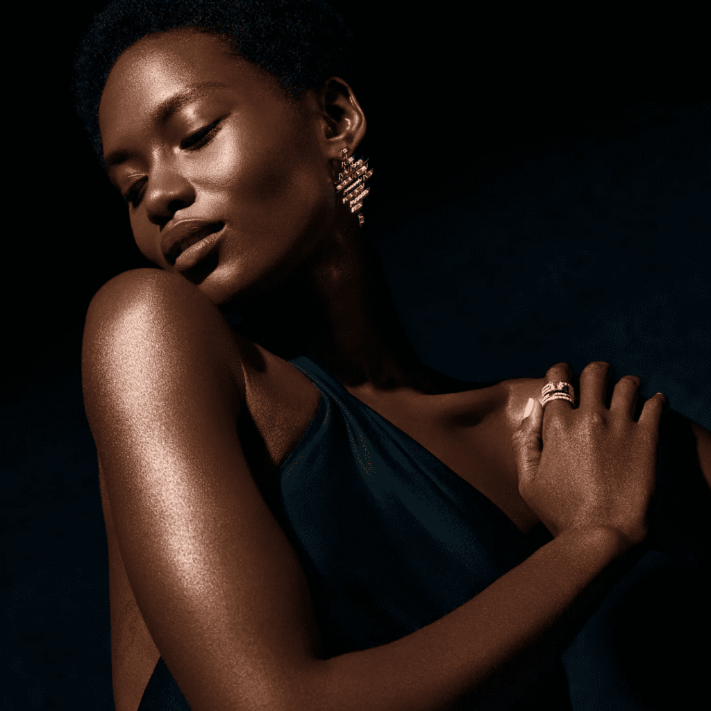 Gorgeous Dark Skinned Woman with a Diamond Ring and Diamond Dangle Earrings