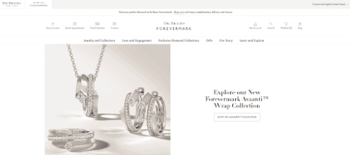 De Beers Forevermark homepage, with diamond rings on display, with an option to explore their new Forevermark avanti wrap collection range