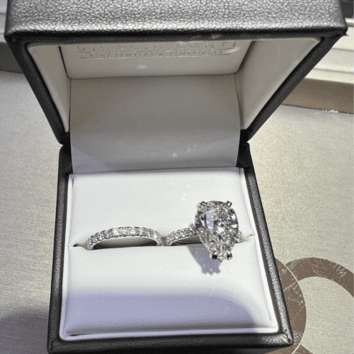 Wedding set, diamond eternity wedding band and chunky pear cut diamond ring