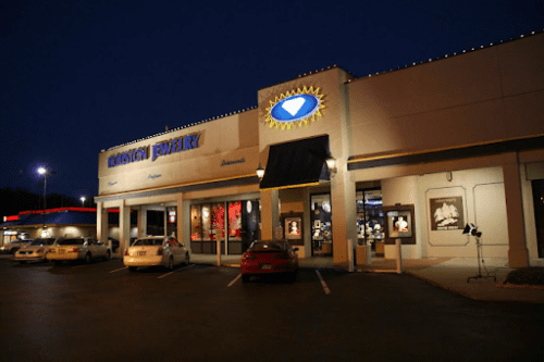 Houston Jewelry brick and mortar store, with cars parked out front