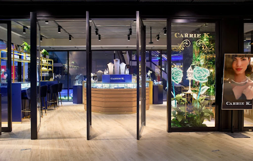Carrie K Atelier's black, open and green storefront in Singapore