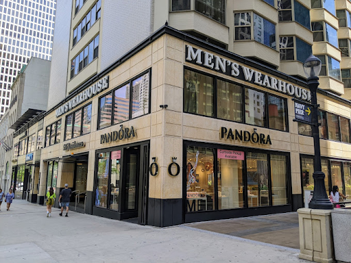 Pandora's storefront on the bottom floor, with a men's wearhouse above the Pandora storefront