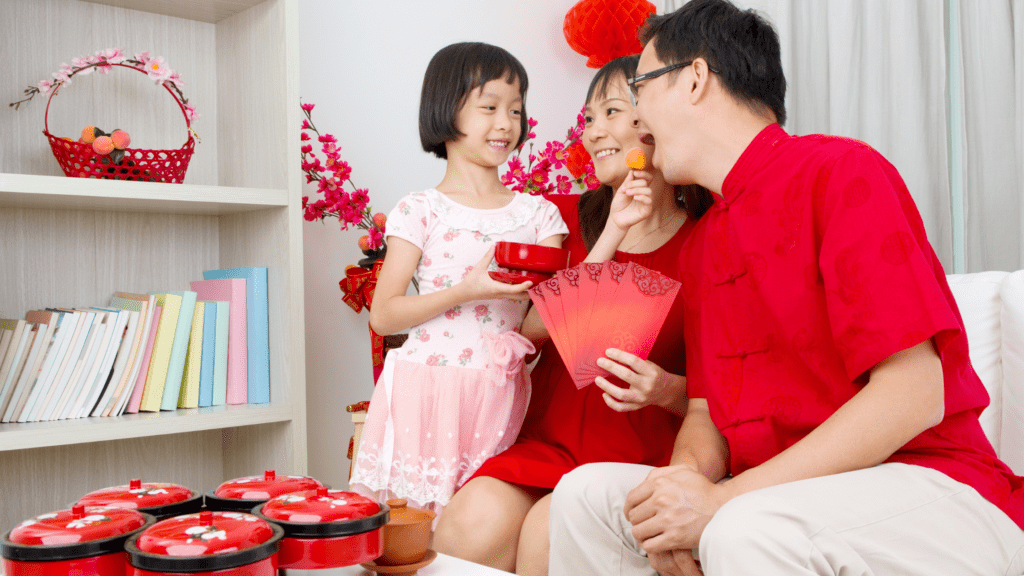 Asian family with red envelopes