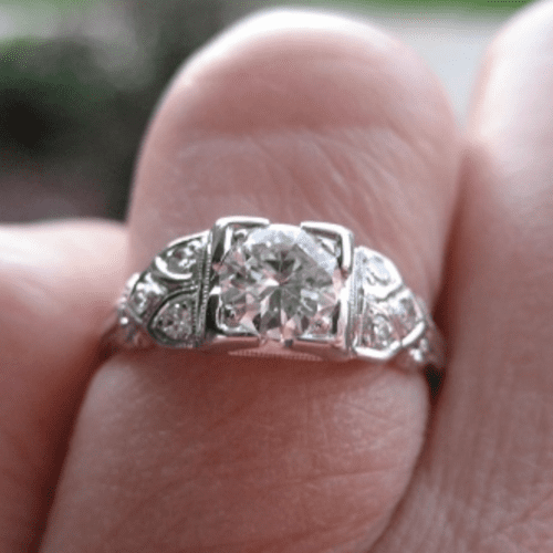 Vintage diamond ring on a finger