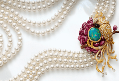 bird necklace with 4 strands of pearls