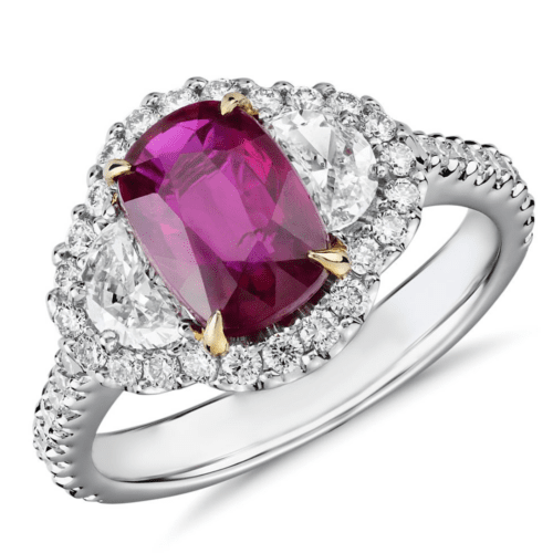 Three-Stone Cushion-Cut Ruby and Half Moon Diamond Halo Ring from Blue Nile.